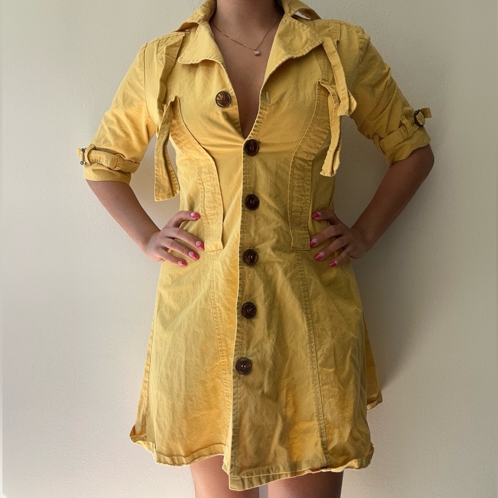 Yellow button up dress.